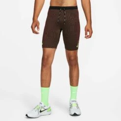 Nike | Men's Dri-Fit ADV Aeroswift Half Tight -Sportswear Sale Shop DM4622 014 M Nike Dri FitADVAeroswiftHalfTight frontonbody2